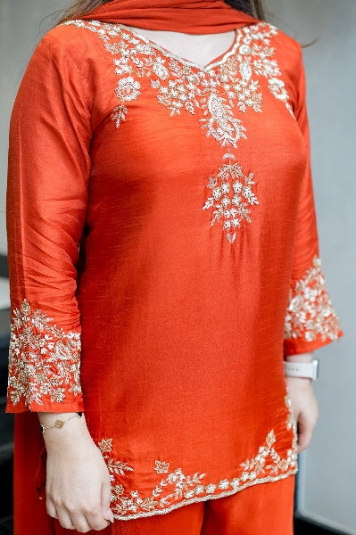 Vibrant Orange Natural Crepe Sharara Set with Intricate Gold Zari & Floral Embroidery