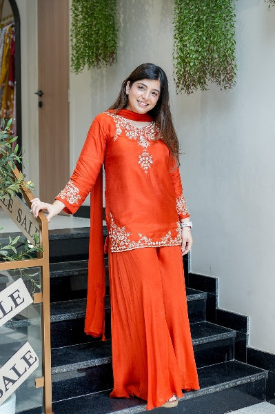 Vibrant Orange Natural Crepe Sharara Set with Intricate Gold Zari & Floral Embroidery