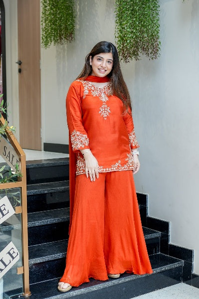 Vibrant Orange Natural Crepe Sharara Set with Intricate Gold Zari & Floral Embroidery