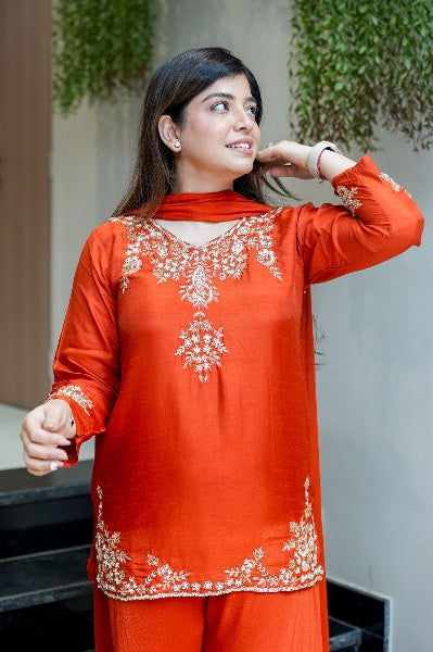 Vibrant Orange Natural Crepe Sharara Set with Intricate Gold Zari & Floral Embroidery