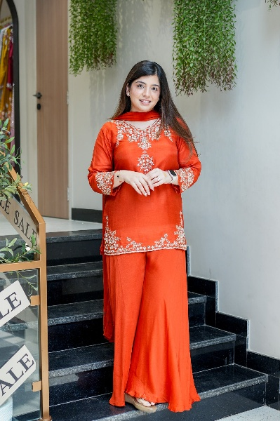 Vibrant Orange Natural Crepe Sharara Set with Intricate Gold Zari & Floral Embroidery